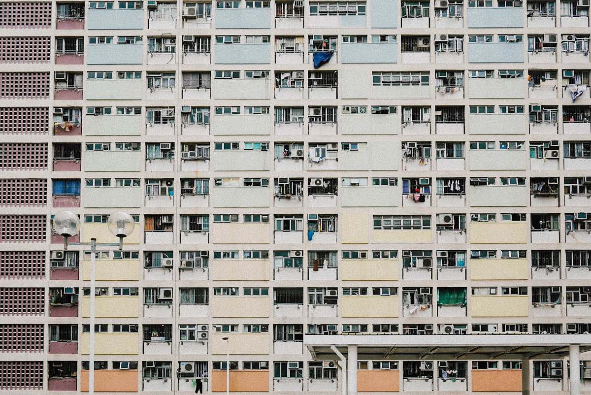 high rise white concrete high-rise building urban